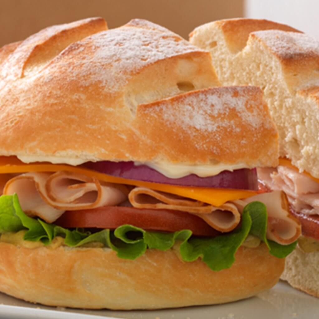 image of an individual lunch sandwich with chips from Noah’s NY Bagels